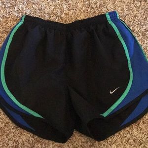 Black green and blue Nike shorts